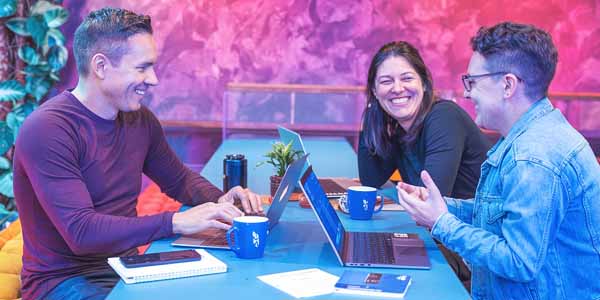 Three AI officers at meeting